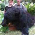 13 year old Matt with his Dad and matts first giant Island Bear